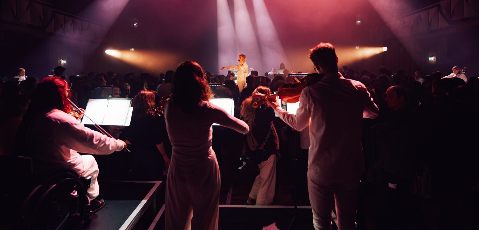 Tussen de musici in het Concertgebouw