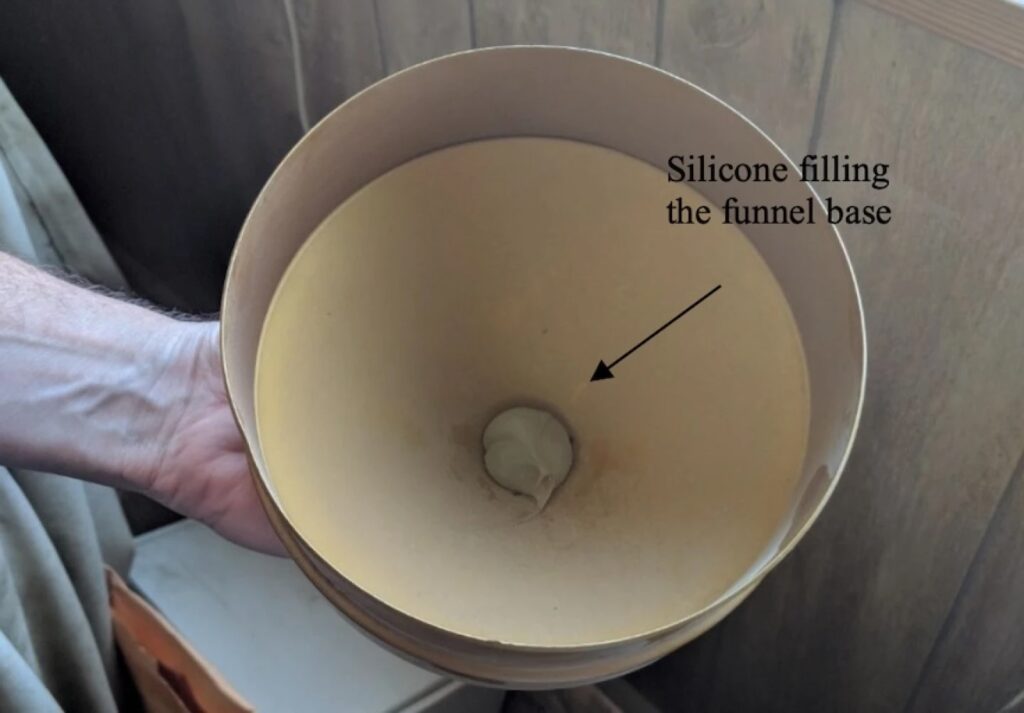 HOR 258 Another NWS funnel plugged with silicone.Photo USDA OIG