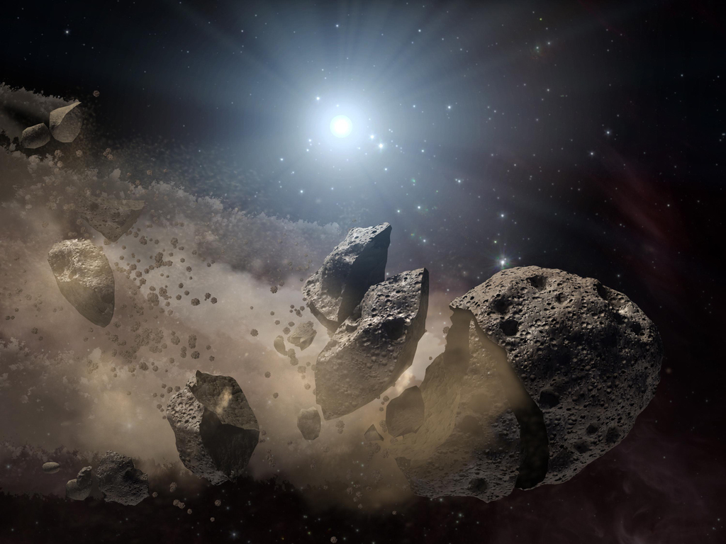 Artist impression van een uiteenspattende asteroïde. – © NASA