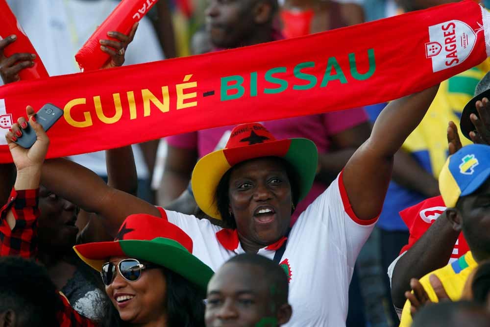 Supporters van Guinee-Bissau tijdens de openingwedstrijd van de Afrika Cup tegen Gabon. © Mike Hutchings / Reuters