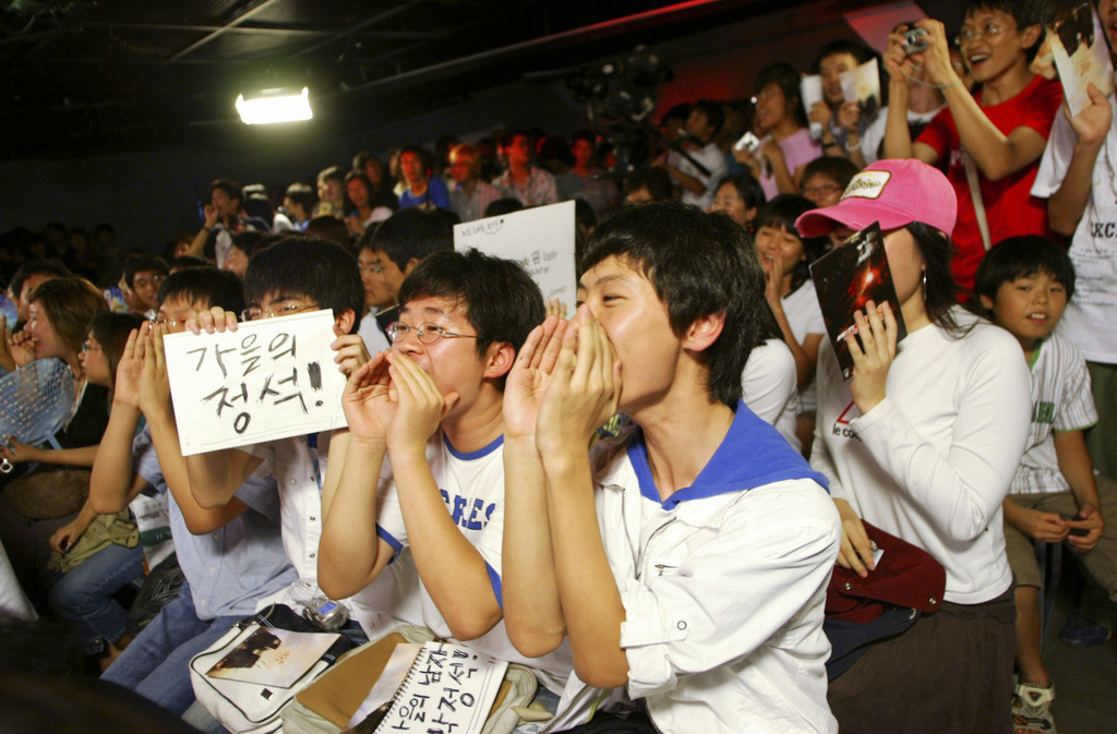 Fans moedigen hun favoriete gamers aan. – © Chung Sung-Jun / Getty Images