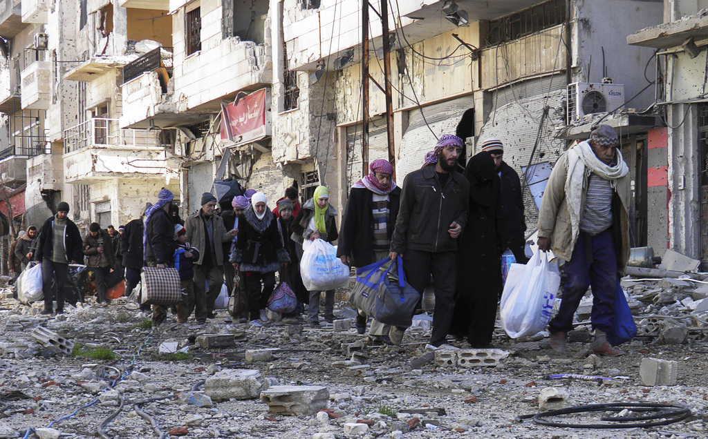 Evacuatie uit Homs - © Thaer Al Khalidiya/Reuters