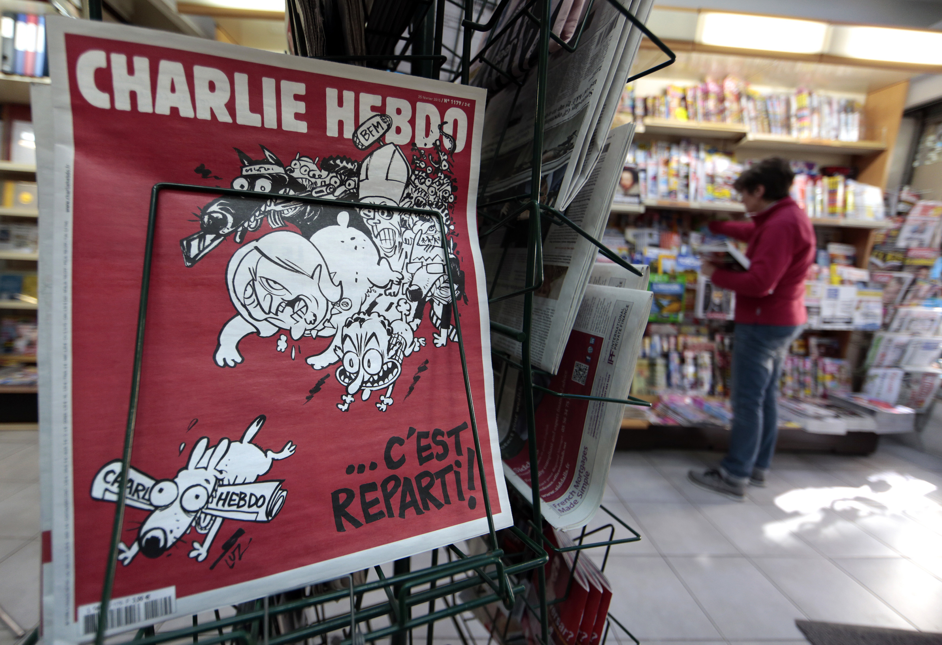 Het laatst verschenen nummer van Charlie Hebdo: ‘... Daar gaan we weer!’ – © Getty / Reuters