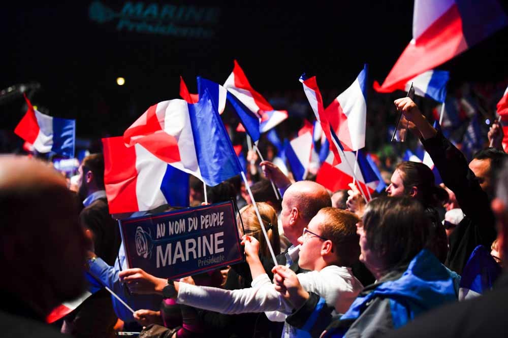  Aanhangers van Marine Le Pen op een bijeenkomst in Châteauroux. – © HH