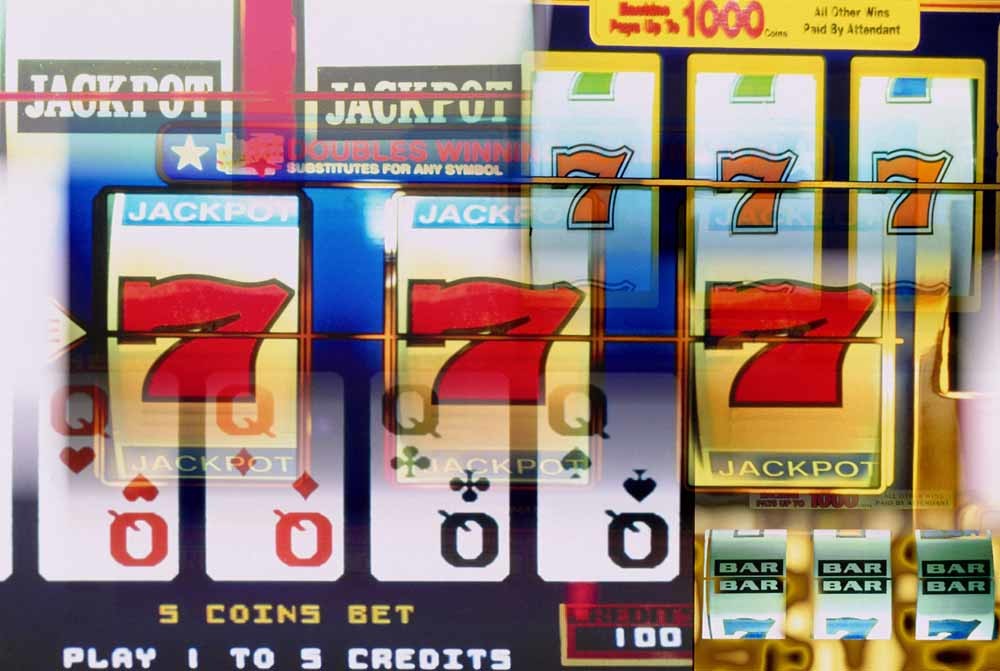 Een fruitmachine met jackpotcombinaties. – © Getty Images