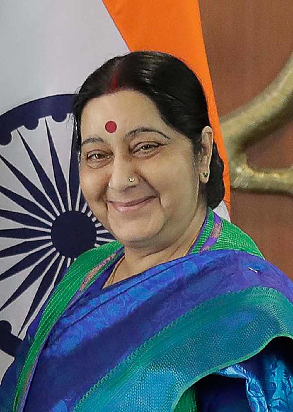 426px secretary tillerson is greeted by indian minister of external affairs swaraj 24074726498 cropped