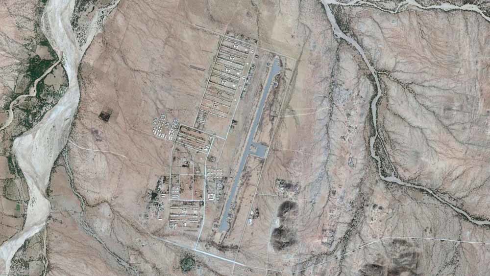 Satellietbeeld van de militaire basis Sawa, inclusief de Warsai Ykiealo-school. Leger en politie organiseren geregeld razzia’s om vermeende dienstplichtontduikers te arresteren. – © Google Earth